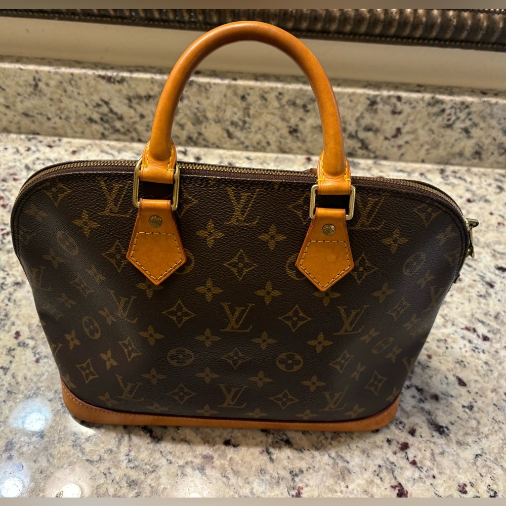 Authentic LOUIS VUITTON Alma Handbag